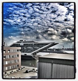 Built structure against cloudy sky