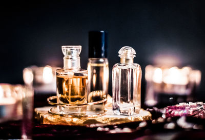 Close-up of wine glasses on table