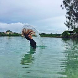 Man swimming in lake