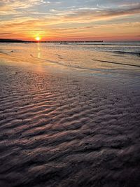 Scenic view of beach during sunset