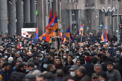 Group of people on street in city