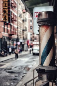 Close-up of vintage car on street