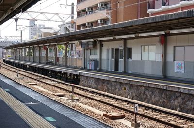 Railroad station platform against sky