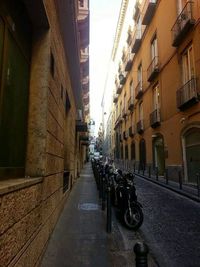 Cars parked on road in city