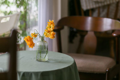 Close-up of vase on table at home