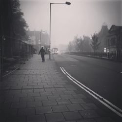 Man on street in city