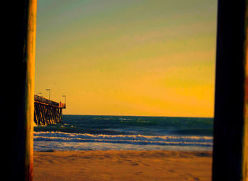 Scenic view of sea at sunset
