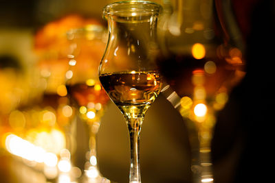 Close-up of wine glass on table