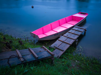 High angle view of nautical vessel moored on lake