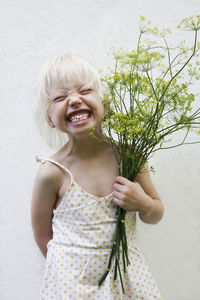 Girl holding fennel bouquet