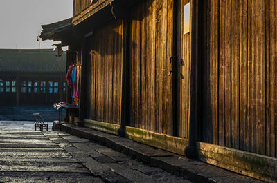 Empty footpath by building in old town