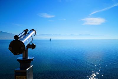 Scenic view of sea against blue sky