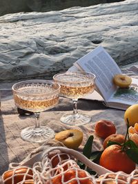 High angle view of beer on table at beach