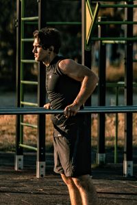 Full length of young man standing in park