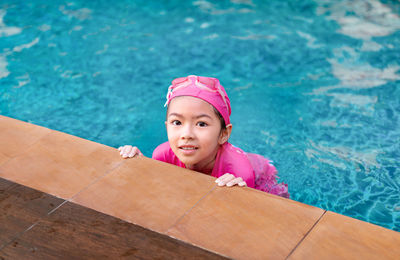 Portrait of girl in swimming pool