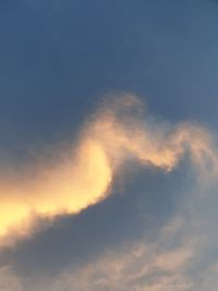 Low angle view of cloudy sky during sunset