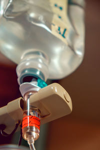 Close-up of light bulb on table