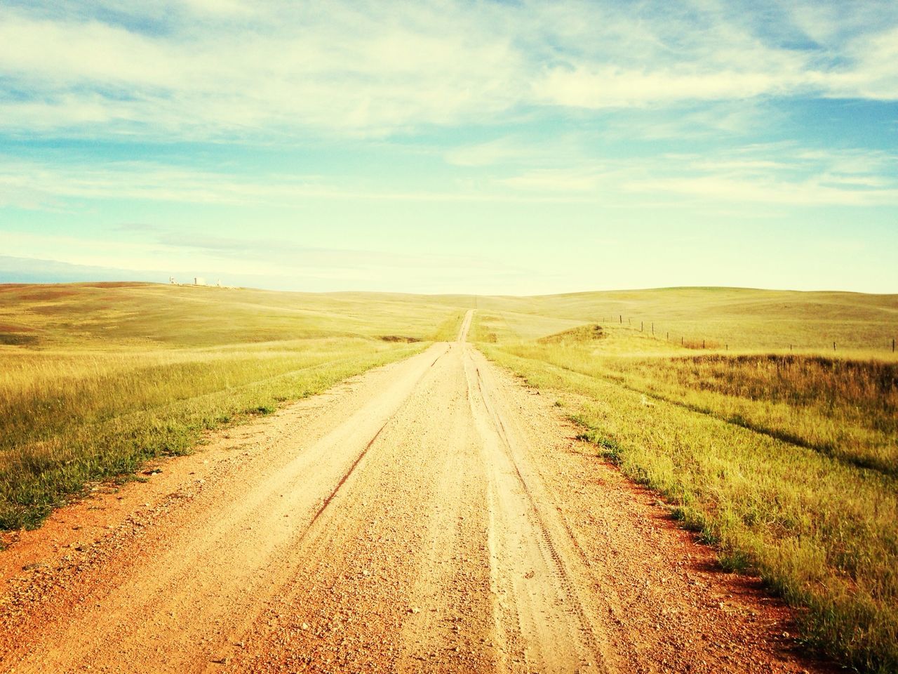 the way forward, diminishing perspective, landscape, vanishing point, sky, tranquil scene, dirt road, tranquility, field, rural scene, road, nature, transportation, agriculture, country road, horizon over land, scenics, grass, long, beauty in nature