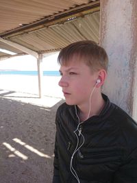 Portrait of young man looking away