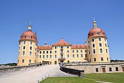 View of historic building against clear blue sky