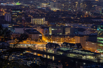 High angle view of illuminated buildings at night