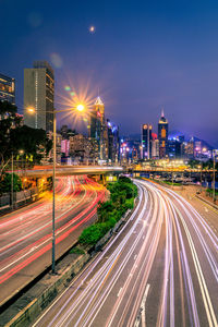 Light trails on city street at night