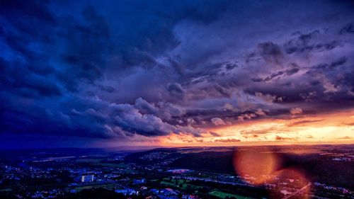 Aerial view of city at sunset