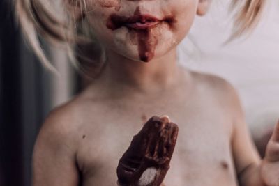 Close-up of girl eating ice cream