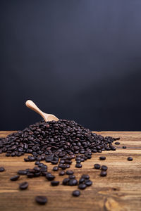 Close-up of coffee beans on table