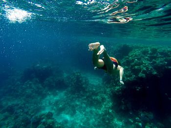 Man swimming in sea