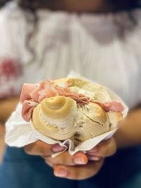 Close-up of hand holding ice cream