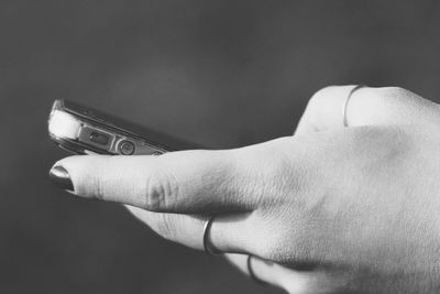 Cropped image of woman holding hands