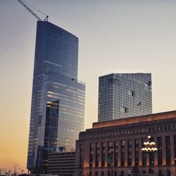 Low angle view of skyscrapers against sky