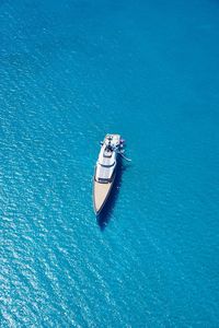 High angle view of sailboat sailing in sea