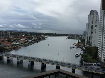 High angle view of river with buildings in background