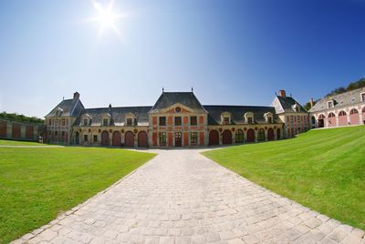 Chateau de vaux-le-vicomte against blue sky on sunny day