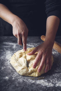 Close-up of person preparing food