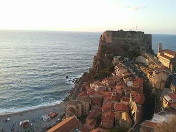 View of town with sea in background