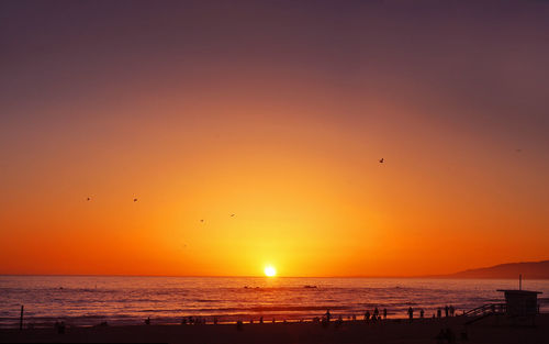 Scenic view of sea at sunset