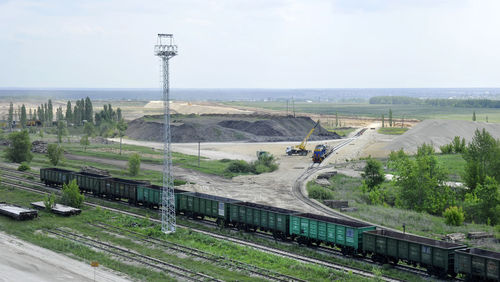 High angle view of freight train by quarry