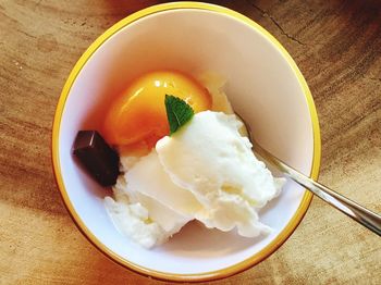 High angle view of ice cream in bowl on table