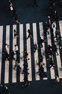 High angle view of people on road