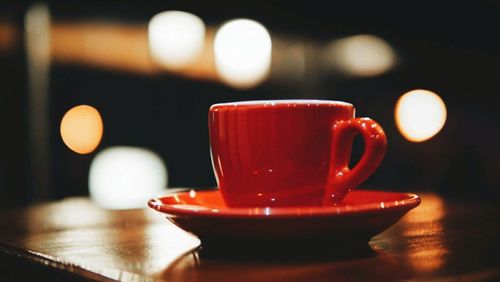 Close-up of coffee cup on table