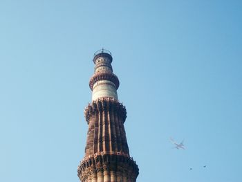 Low angle view of building against blue sky