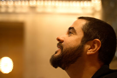 Portrait of young man looking away