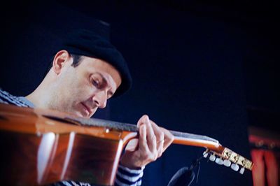 Low angle view of guitarist performing at concert