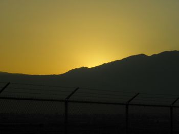 Scenic view of mountains at sunset