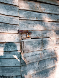 Full frame shot of weathered wooden door