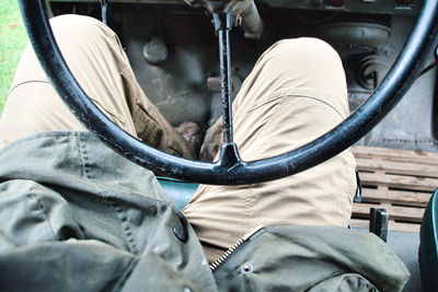 Close-up of man driving car