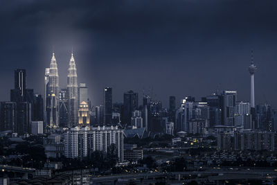 Modern buildings in city against sky